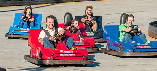 People riding go karts