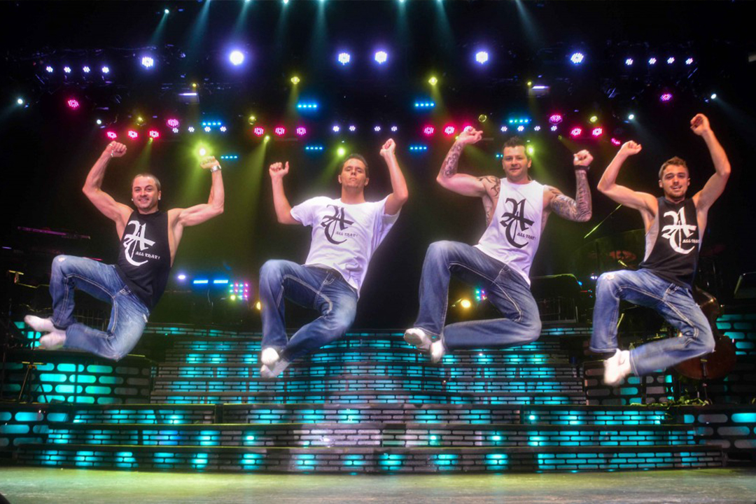4 male dancers clogging from The Carolina Opry
