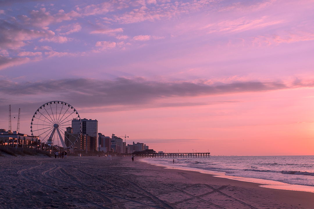 Myrtle Beach coastline during sunset with pink and purple skys