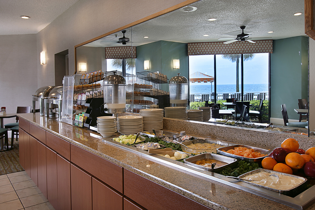 Breakfast buffet with wide selection and ocean views in the back ground