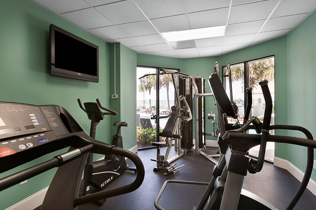 fitness center showcasing 5 different workout machines