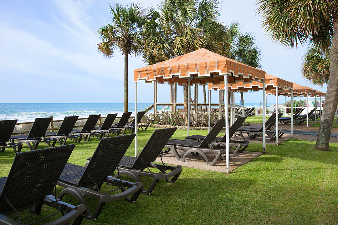 ocean front tanning lawn with cabanas