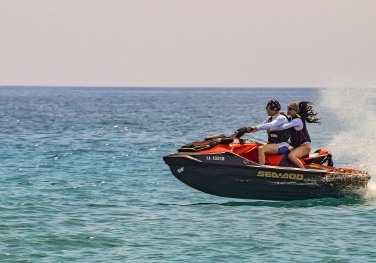 Couple on a Jetski in the ocean